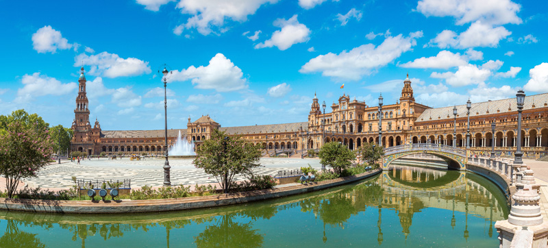 Panorama of Spanish Square (Plaza de Espana) in Sevilla in a beautiful summer day, Spain